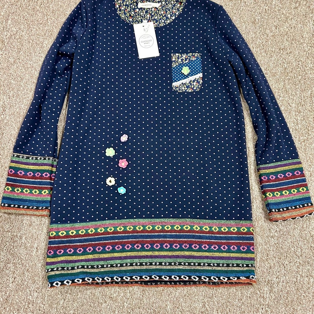 Guoguo NWT stylish pullover shirt with warm fuzzy interior lining.